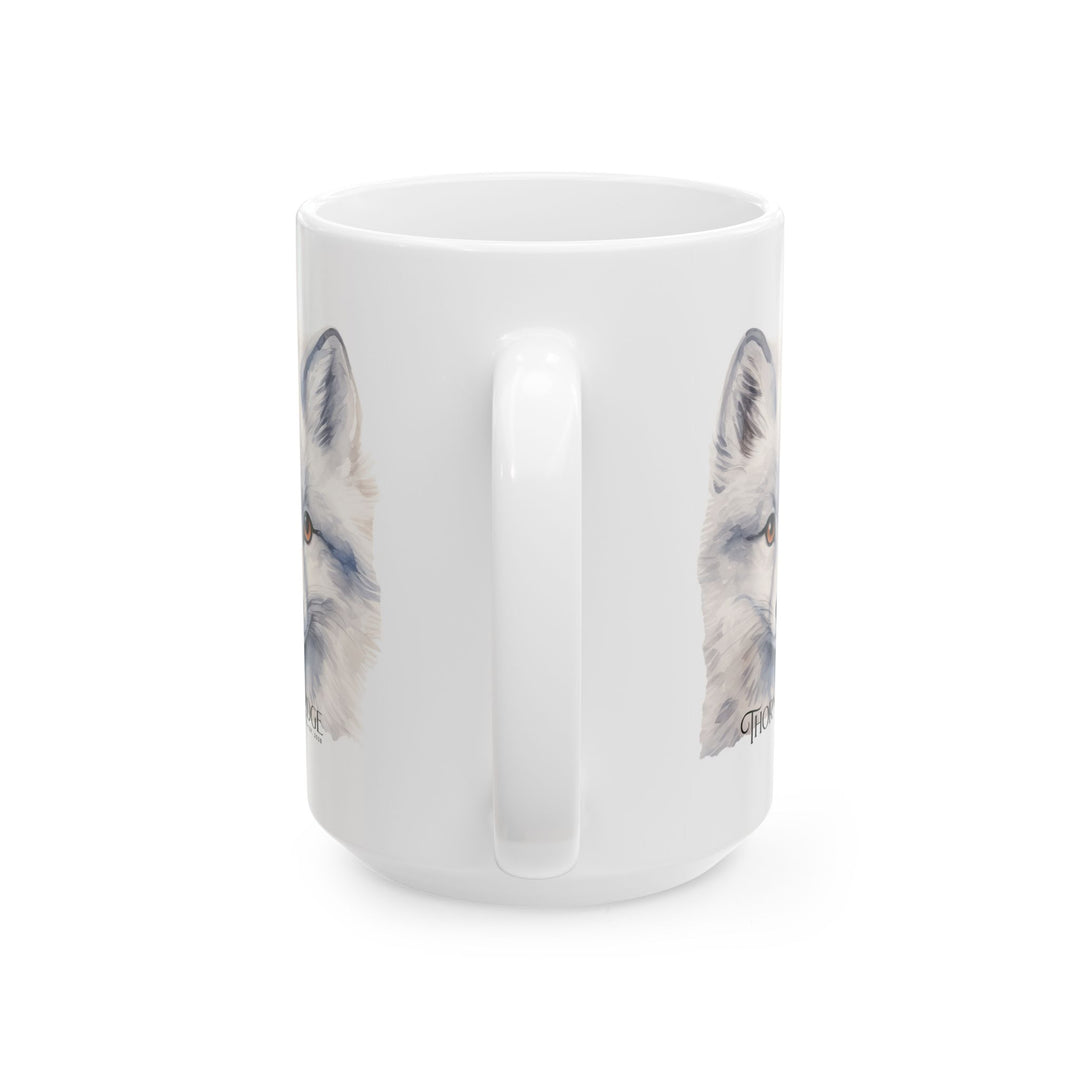 White mug with a graphic of a artic fox head and 'Thorn Ridge' text on a white background