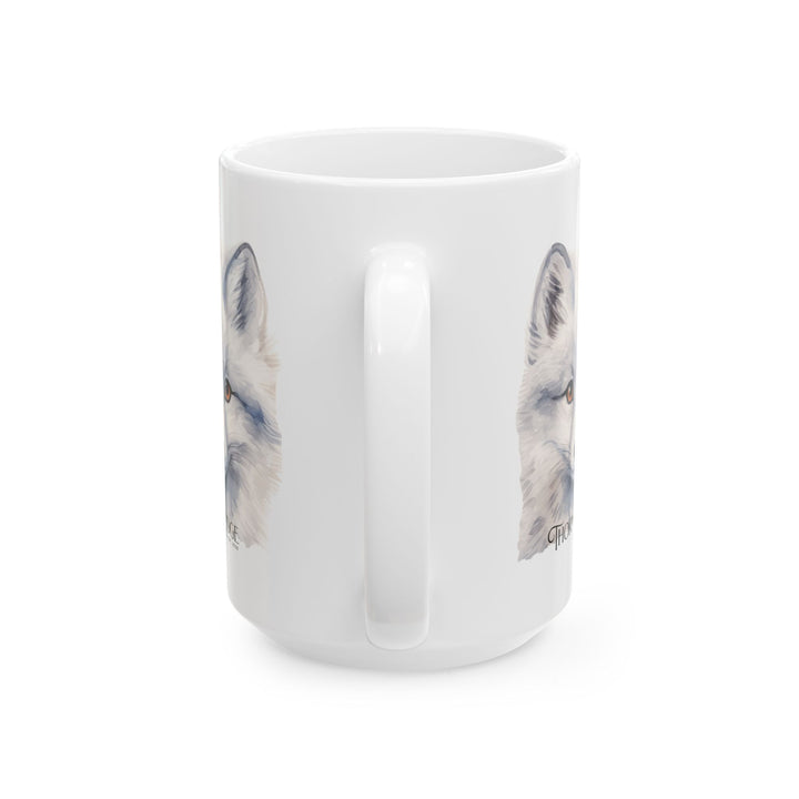 White mug with a graphic of a artic fox head and 'Thorn Ridge' text on a white background