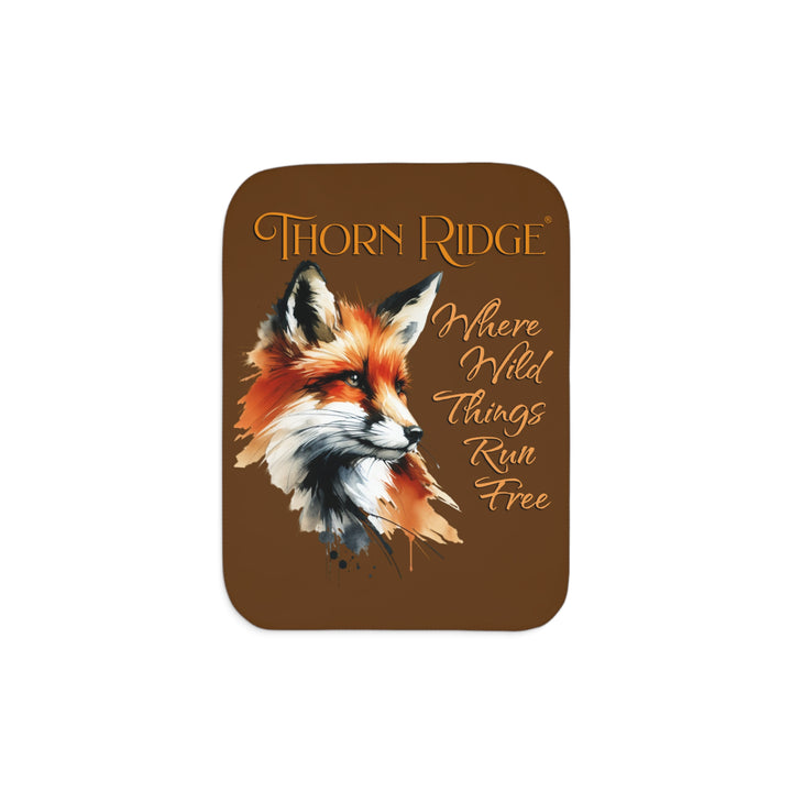 Red fox sherpa blanket with the text Thorn Ridge® Where Wild Things Run Free