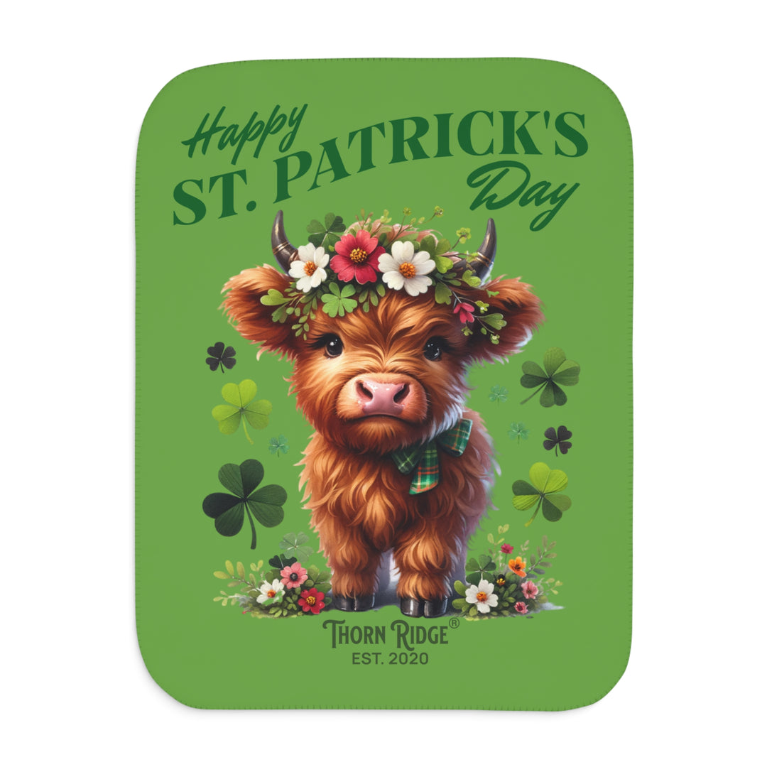 St. Patrick's Day Sherpa Blanket with a Highland cow and floral decorations on a green background branded Thorn Ridge est. 2020.