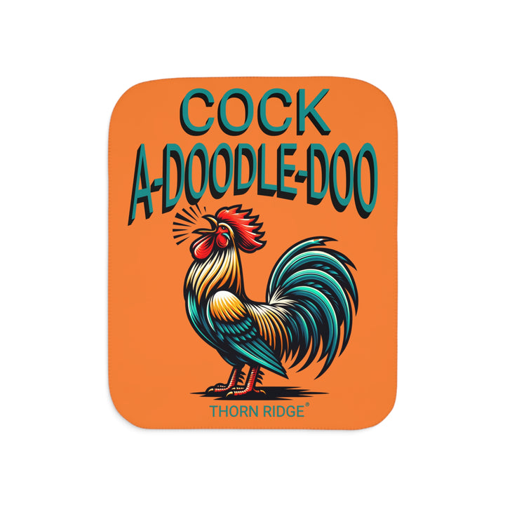 Orange sherpa blanket with a rooster illustration and 'Cock A Doodle Doo' text with branding Thorn Ridge®