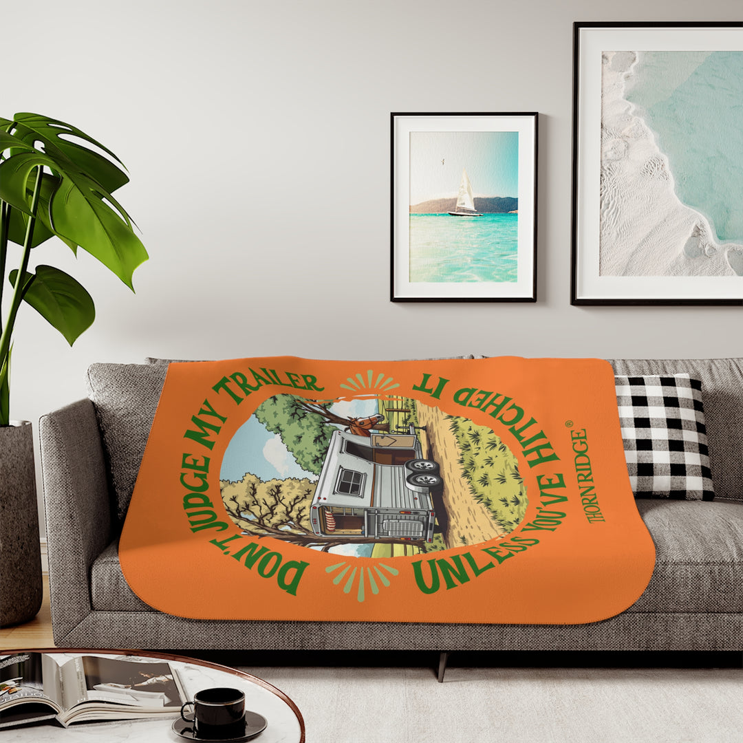 Don't Judge My Trailer Unless You've Hitched It orange sherpa blanket with a horse trailer and horse on it and branded Thorn Ridge®
