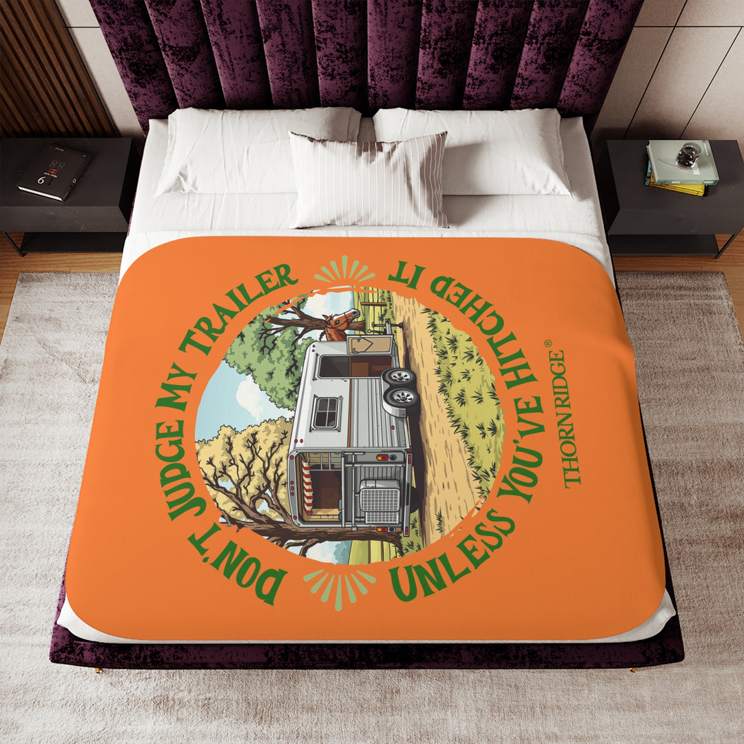 Don't Judge My Trailer Unless You've Hitched It orange sherpa blanket with a horse trailer and horse on it and branded Thorn Ridge®