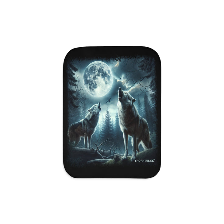 Moonlit Wolves sherpa blanket by Thorn Ridge® featuring two gray wolves deep in the forest howling at the moon with black birds flying around in the sky.