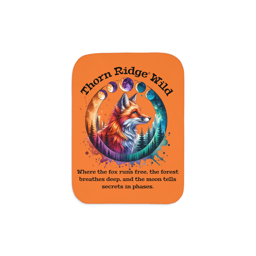 Thorn Ridge® Wild colorful fox design on an orange sherpa blanket with a slogan and moon phases.