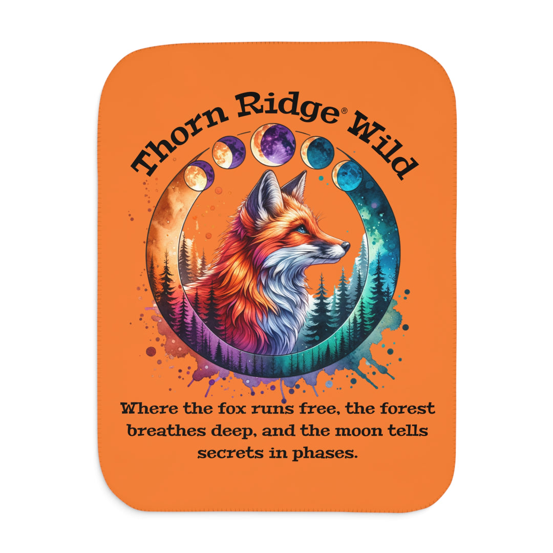 Thorn Ridge® Wild colorful fox design on an orange sherpa blanket with a slogan and moon phases.