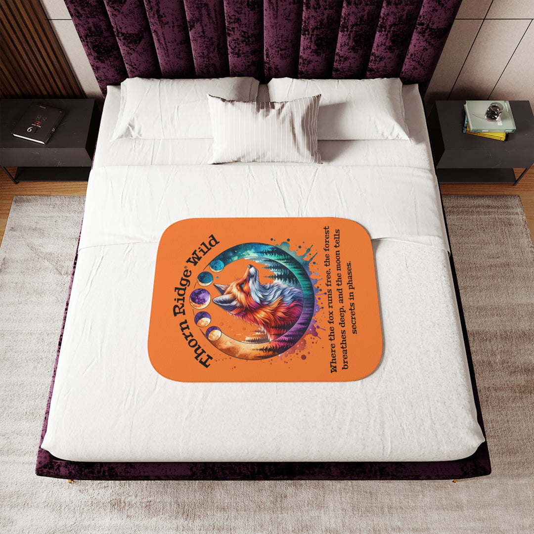 Thorn Ridge® Wild colorful fox design on an orange sherpa blanket with a slogan and moon phases.