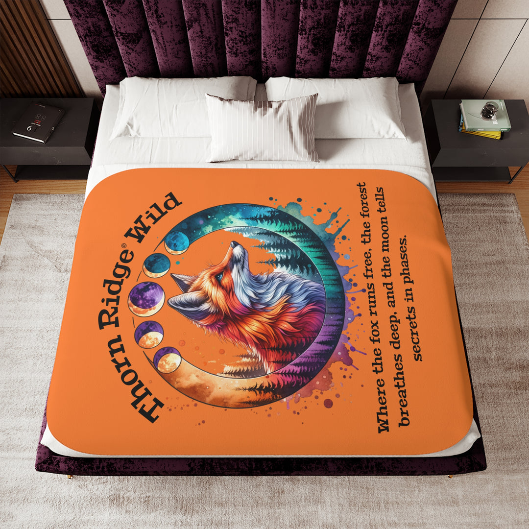 Thorn Ridge® Wild colorful fox design on an orange sherpa blanket with a slogan and moon phases.