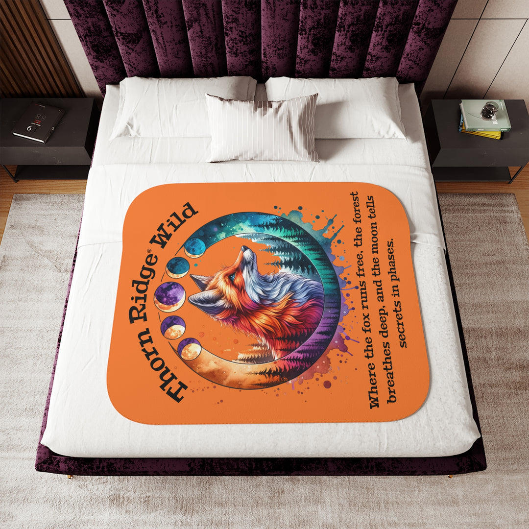 Thorn Ridge® Wild colorful fox design on an orange sherpa blanket with a slogan and moon phases.