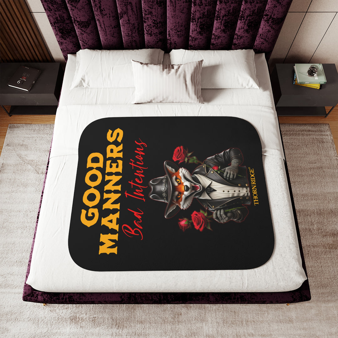 fox character in a black leather jacket and black leather cowboy hat, holding roses, and text 'Good Manners Bad Intentions' on a black sherpa blanket by Thorn Ridge®
