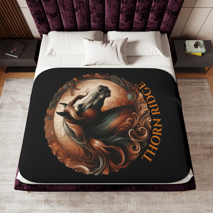 Decorative and elegant horse design in brown and green tones with 'Thorn Ridge®' branding on a black sherpa blanket.