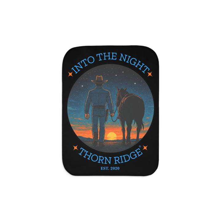 Into the Night by Thorn Ridge® EST 2020 black sherpa blanket with a circle image of a cowboy leading his horse into the sunset with the night sky with stars above them.