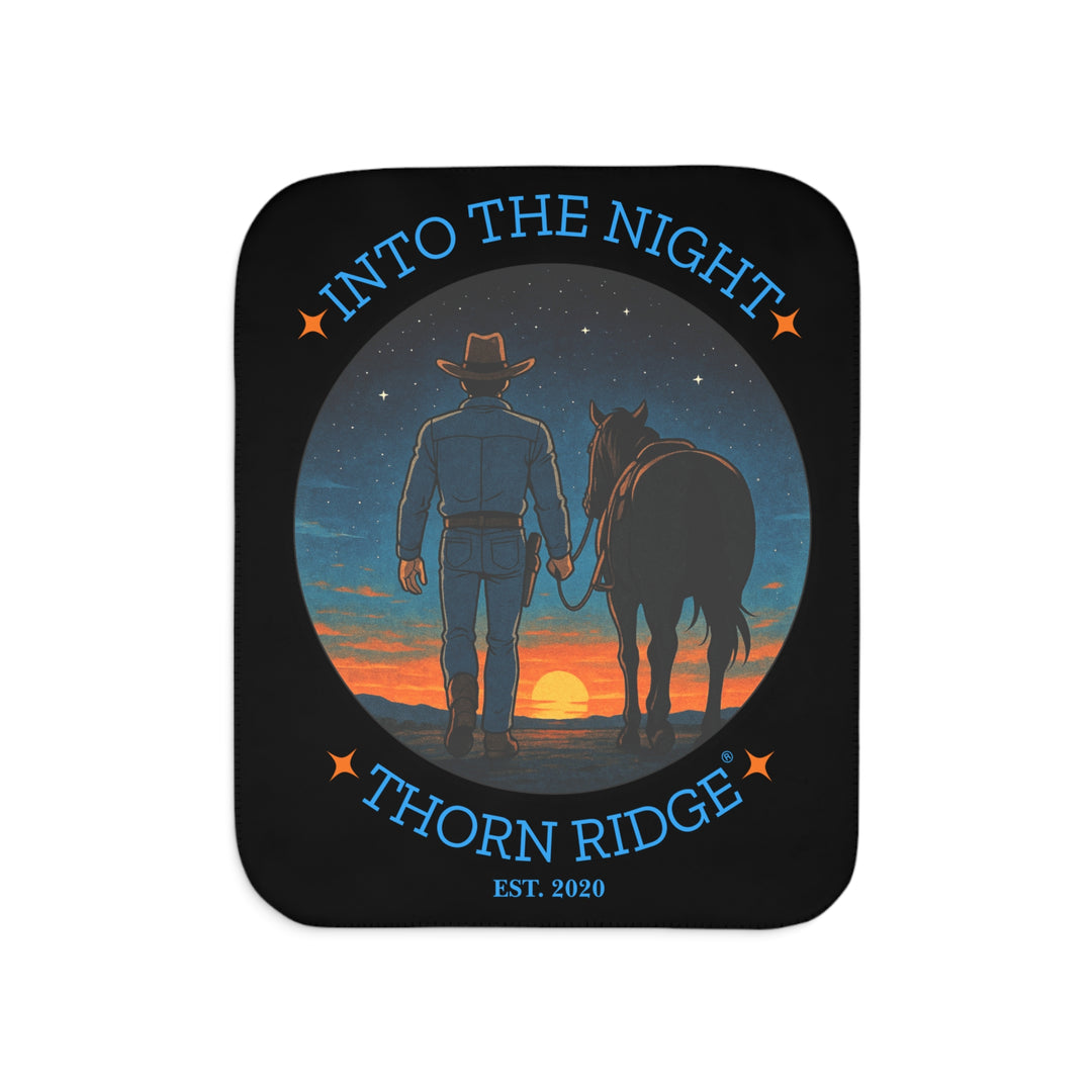 Into the Night by Thorn Ridge® EST 2020 black sherpa blanket with a circle image of a cowboy leading his horse into the sunset with the night sky with stars above them.