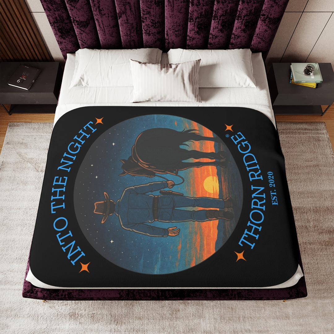 Into the Night by Thorn Ridge® EST 2020 black sherpa blanket with a circle image of a cowboy leading his horse into the sunset with the night sky with stars above them.