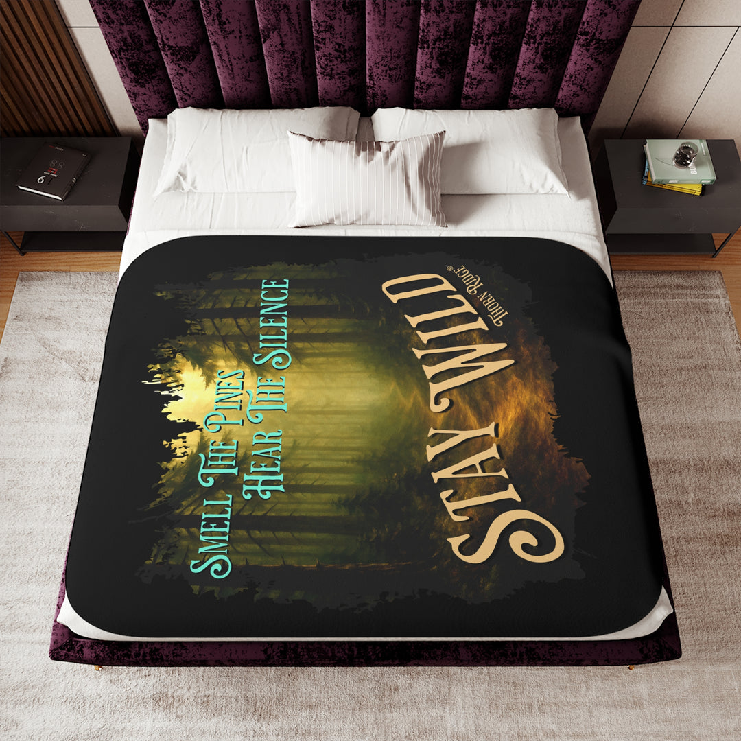 Smell the pines hear the silence stay wild black sherpa blanket with a winding dirt path through the forest in tones of greens and browns by Thorn Ridge®