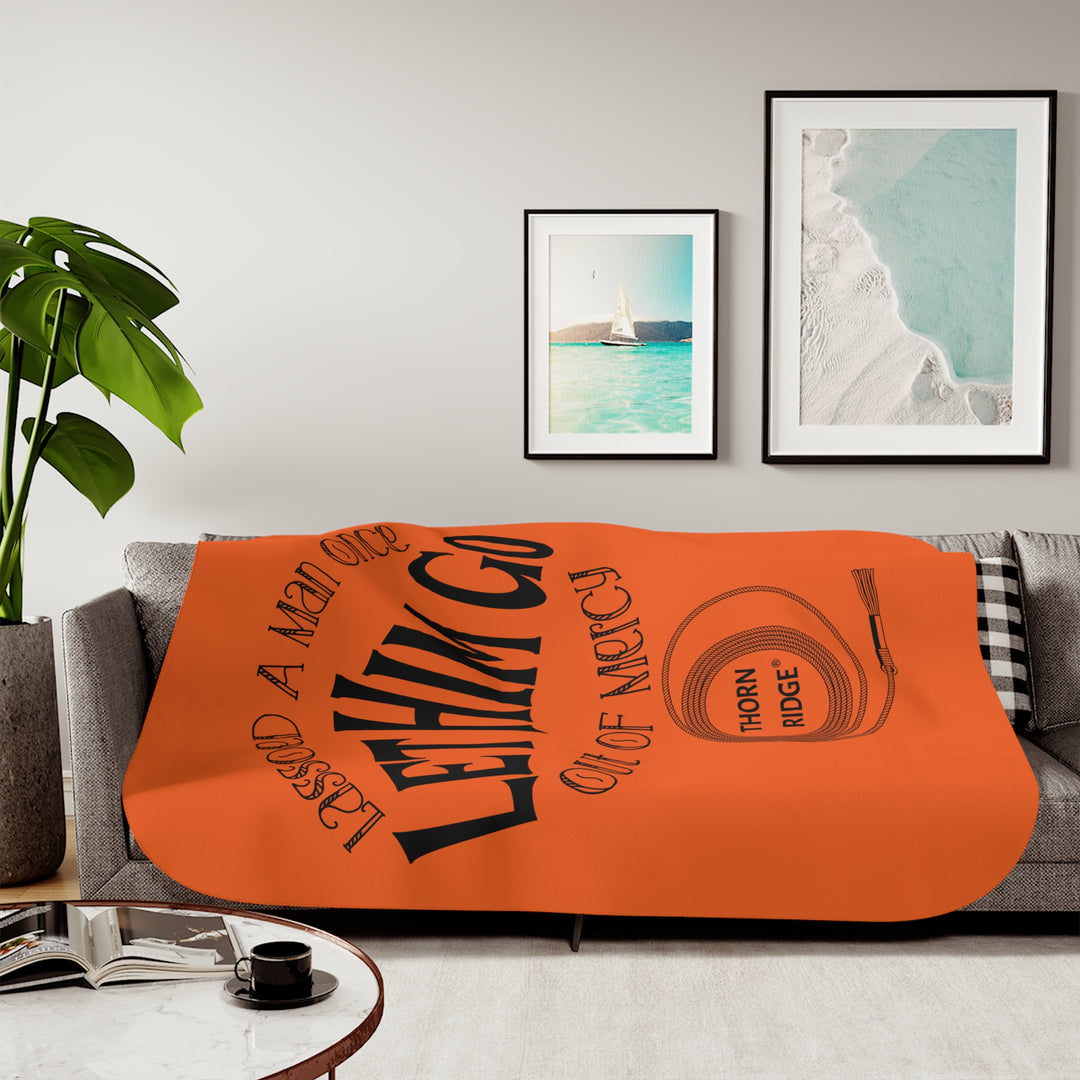 Lassoed a man once Let him go out of mercy orange sherpa blanket by Thorn Ridge®