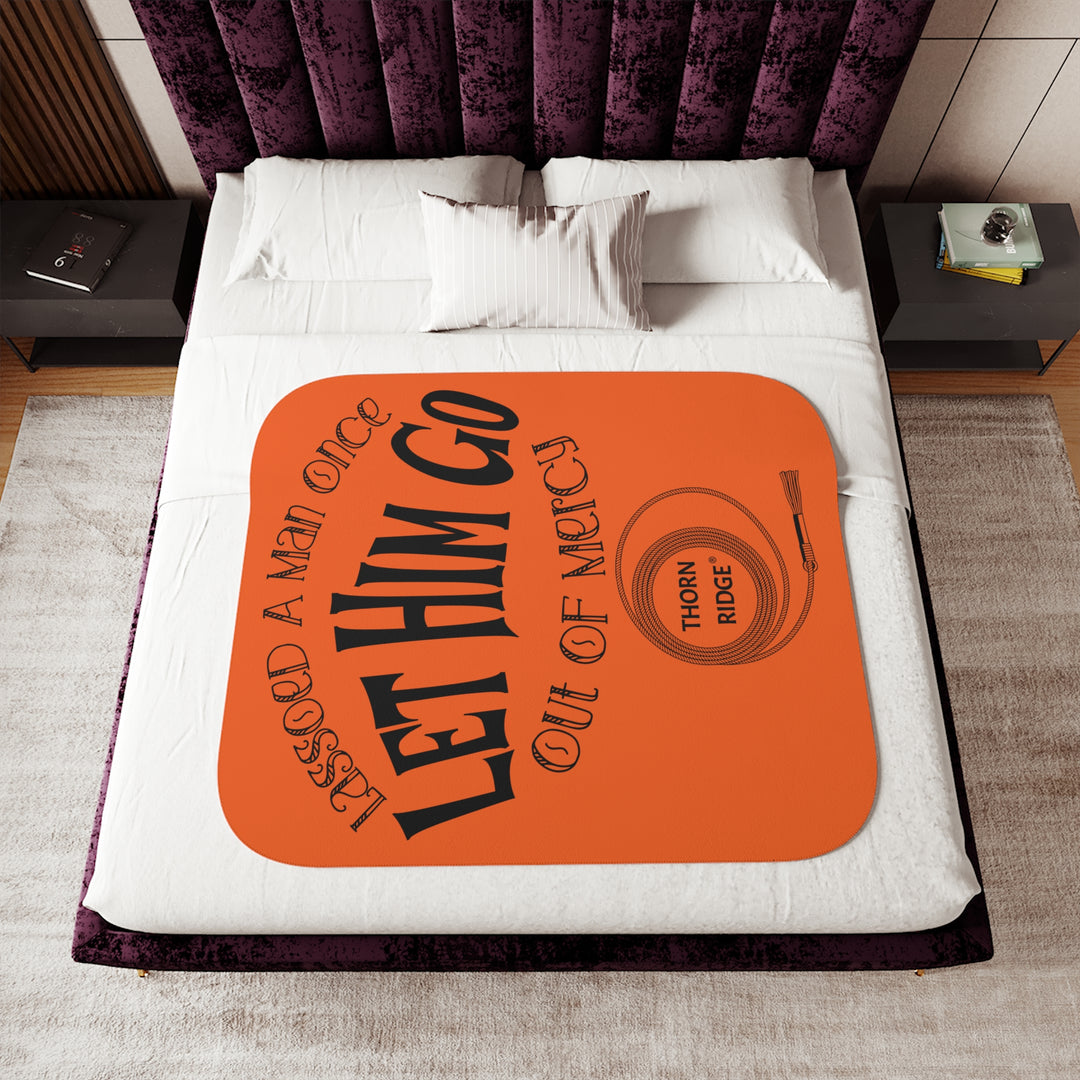 Lassoed a man once Let him go out of mercy orange sherpa blanket by Thorn Ridge®