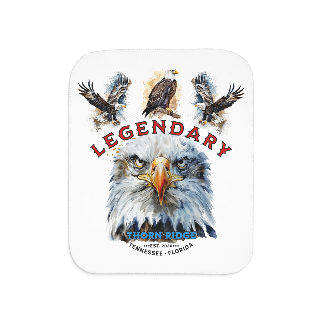 white sherpa blanket with the text Legendary and three bald eagles above the text and a close up of a bald eagle's face below the text. Branded as Thorn Ridge® EST 2020 Tennessee - Florida