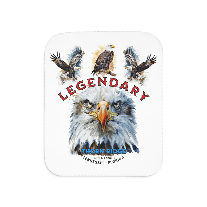 white sherpa blanket with the text Legendary and three bald eagles above the text and a close up of a bald eagle's face below the text. Branded as Thorn Ridge® EST 2020 Tennessee - Florida