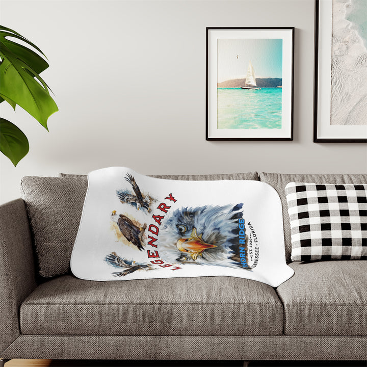 white sherpa blanket with the text Legendary and three bald eagles above the text and a close up of a bald eagle's face below the text. Branded as Thorn Ridge® EST 2020 Tennessee - Florida