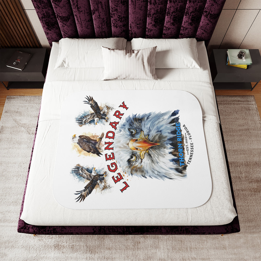white sherpa blanket with the text Legendary and three bald eagles above the text and a close up of a bald eagle's face below the text. Branded as Thorn Ridge® EST 2020 Tennessee - Florida