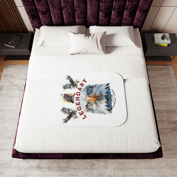 white sherpa blanket with the text Legendary and three bald eagles above the text and a close up of a bald eagle's face below the text. Branded as Thorn Ridge® EST 2020 Tennessee - Florida