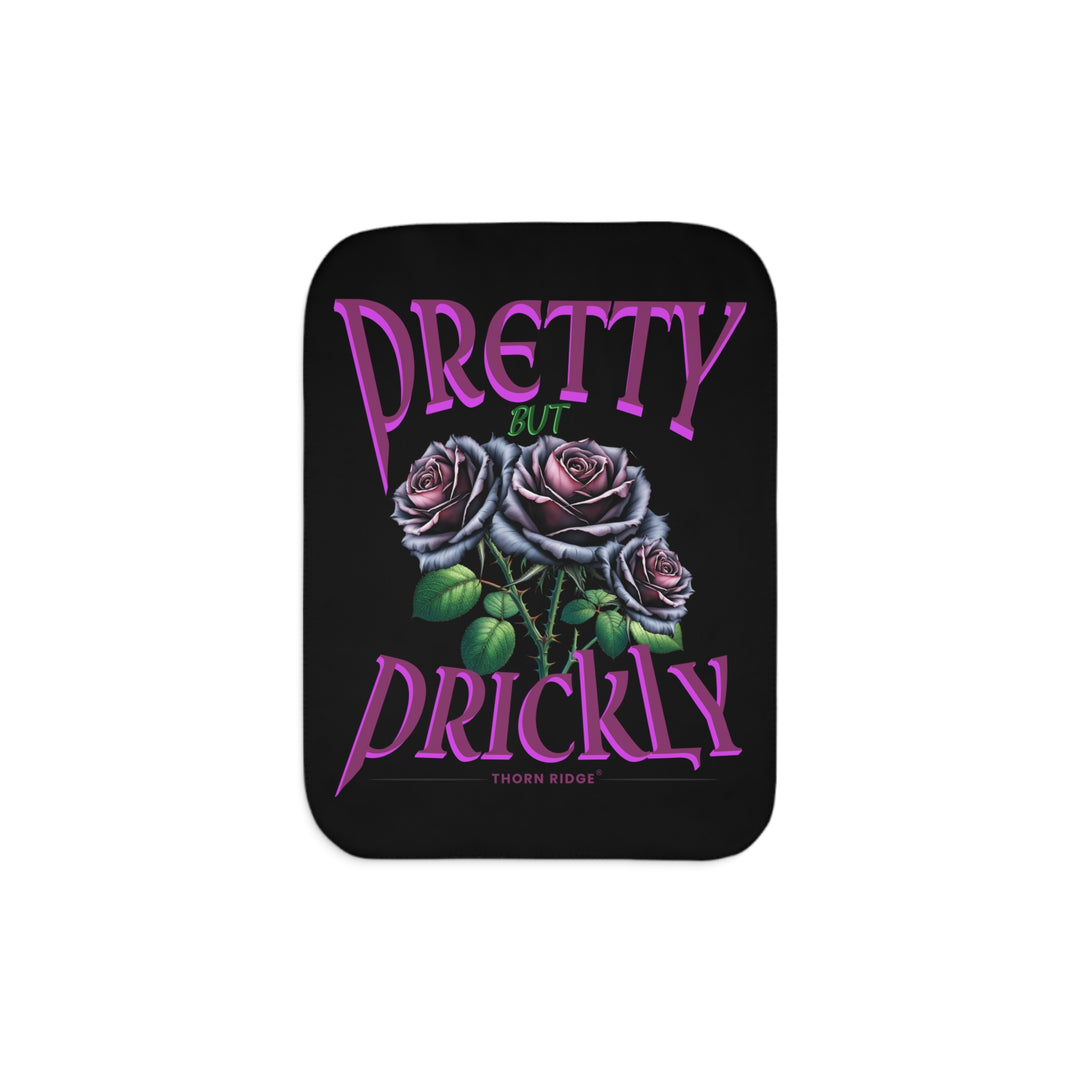 Pretty but Prickly Thorn Ridge® Roses - black and dark purple roses on a black sherpa blanket.