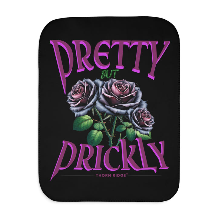 Pretty but Prickly Thorn Ridge® Roses - black and dark purple roses on a black sherpa blanket.