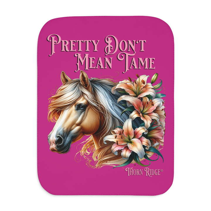 Pretty Don't Mean Tame hot pink sherpa blanket with an illustration of a palomino horse and flowers by Thorn Ridge®