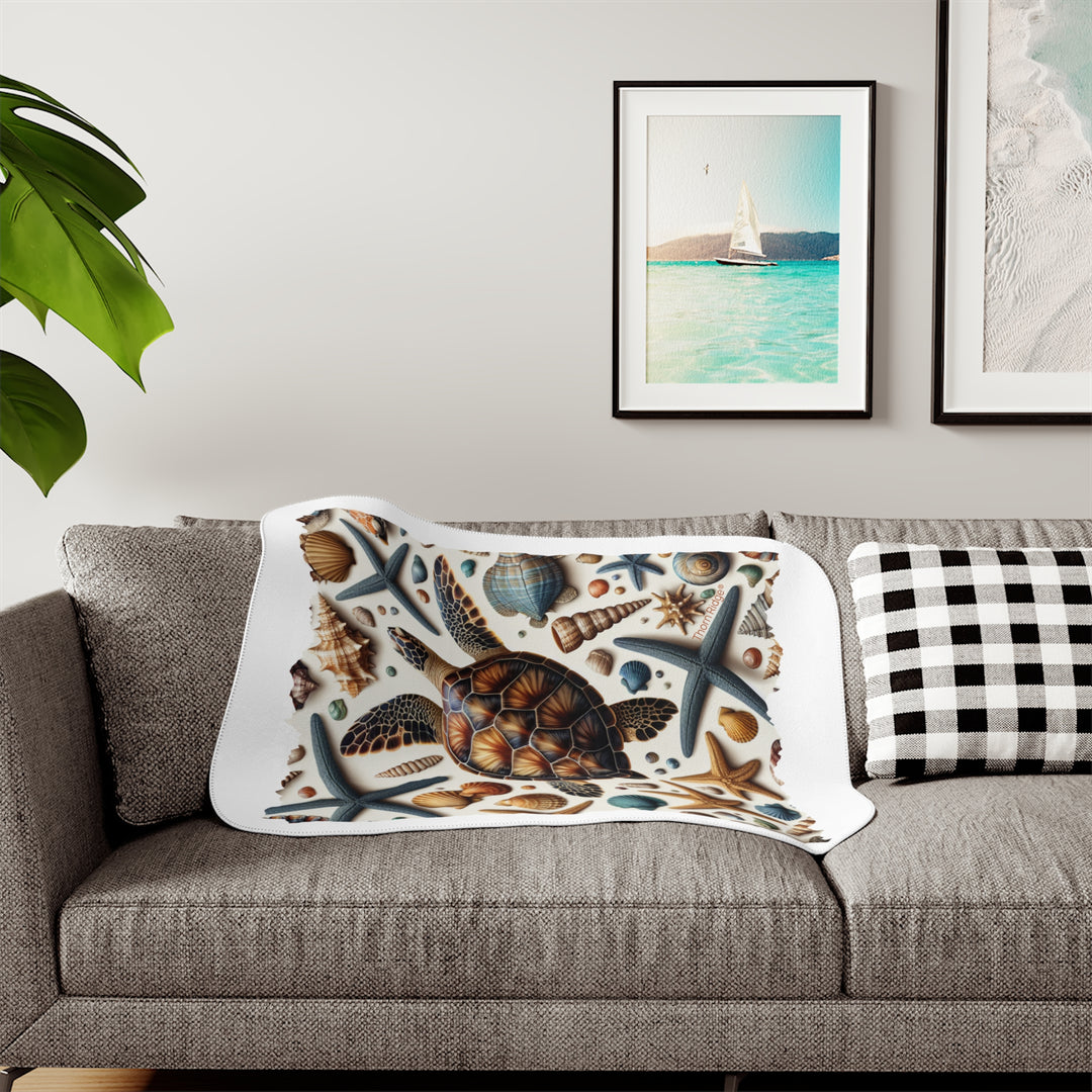 Sea Turtle and sea shells  illustration on a white sherpa blanket branded Thorn Ridge®