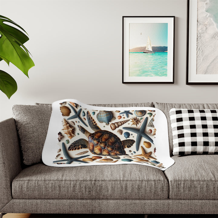 Sea Turtle and sea shells  illustration on a white sherpa blanket branded Thorn Ridge®