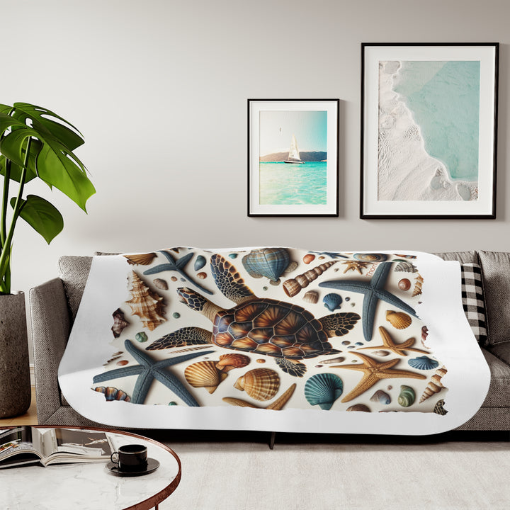 Sea Turtle and sea shells  illustration on a white sherpa blanket branded Thorn Ridge®