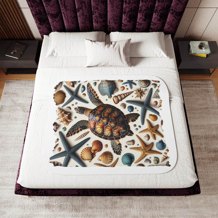 Sea Turtle and sea shells  illustration on a white sherpa blanket branded Thorn Ridge®