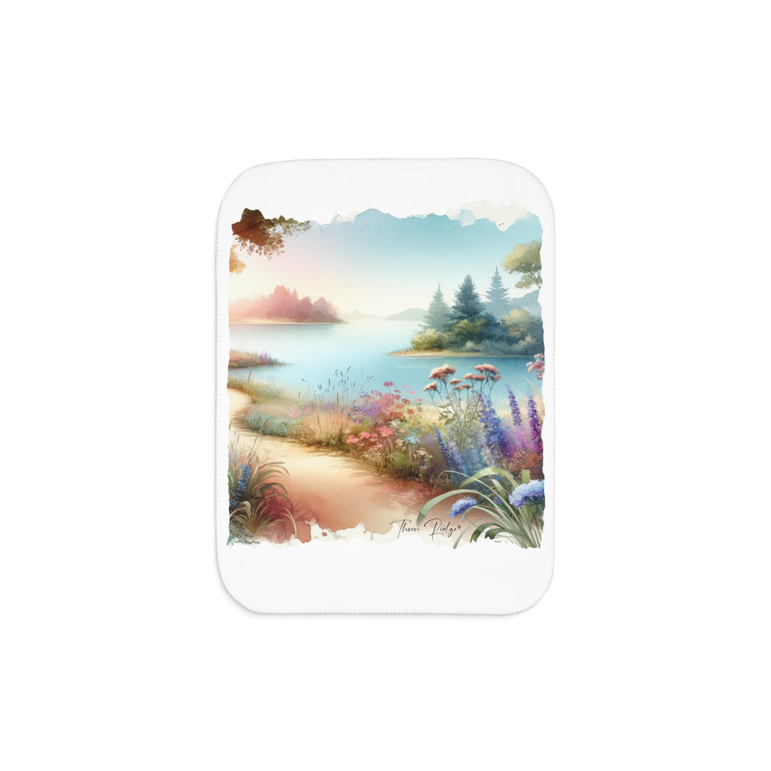 Lakeside Path white Sherpa Blanket with a watercolor image of a serene lake with flowers and a dirt path beside it. Part of Thorn Ridge® legends and lore and branded Thorn Ridge®