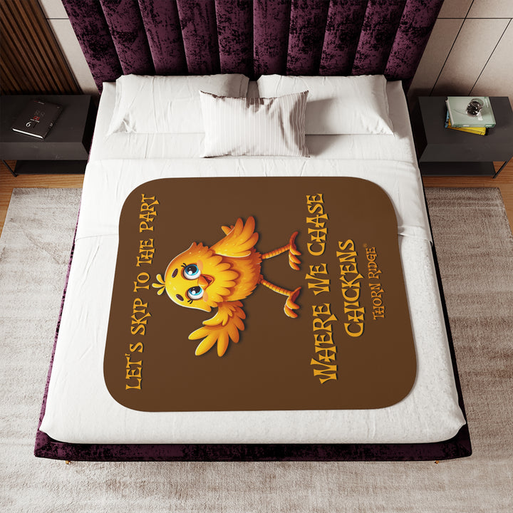 Let's Skip To The Part Where We Chase Chickens brown sherpa blanket with a yellow cartoon chicken waving by Thorn Ridge®