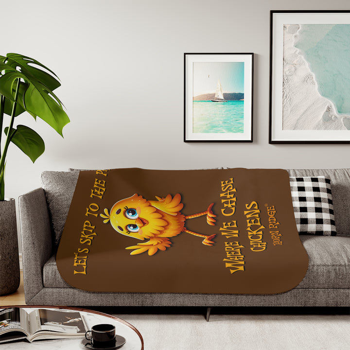 Let's Skip To The Part Where We Chase Chickens brown sherpa blanket with a yellow cartoon chicken waving by Thorn Ridge®