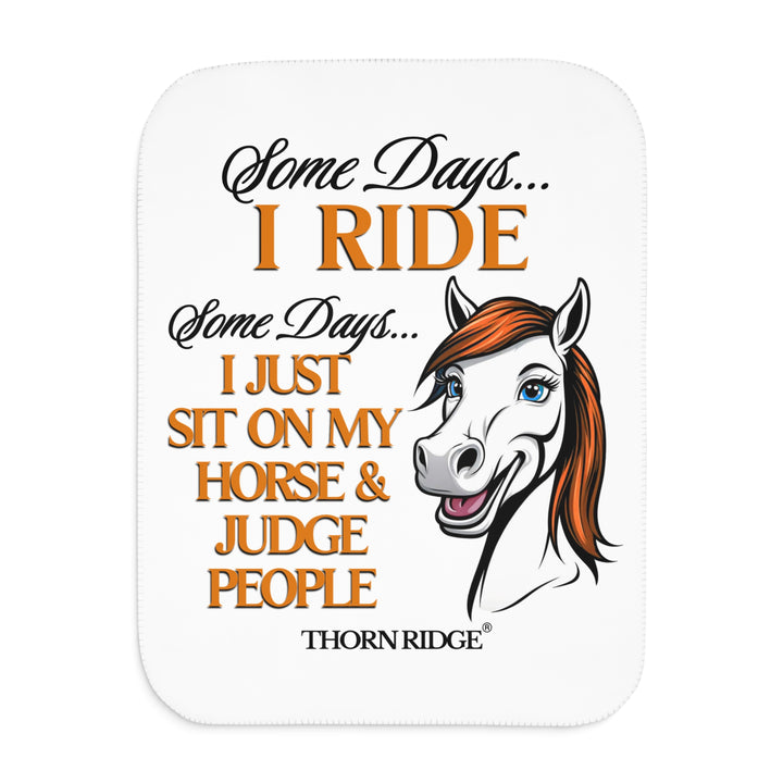 Some Days I ride Some days I just sit on my horse and judge people white sherpa blanket by Thorn Ridge® with  a white horse cartoon with a red mane and blue eyes.