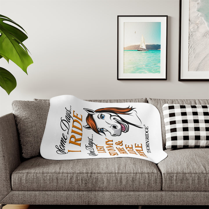 Some Days I ride Some days I just sit on my horse and judge people white sherpa blanket by Thorn Ridge® with  a white horse cartoon with a red mane and blue eyes.