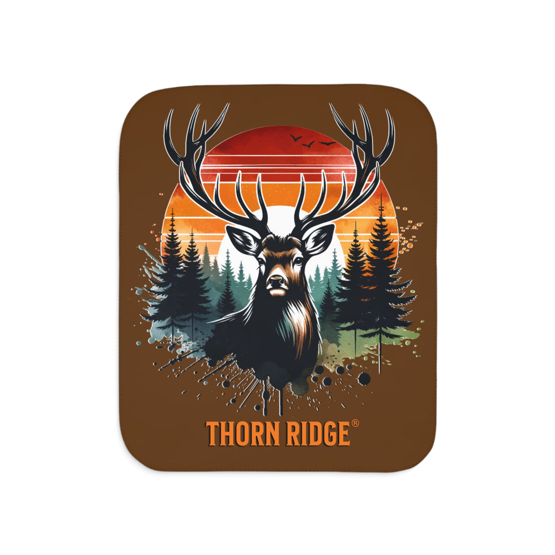 Guardian Buck at Sunset by Thorn Ridge® with an illustration of a buck facing the camera with a sunset in the background and forest trees.