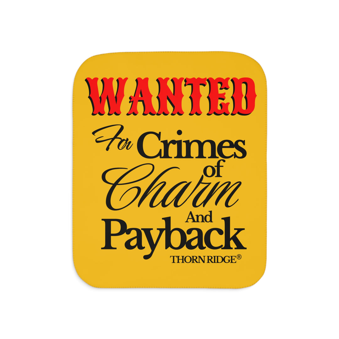 Yellow Sherpa Blanket with Wanted for crimes of charm and payback text branded Thorn Ridge® Wanted is in red text and the rest is in black text.