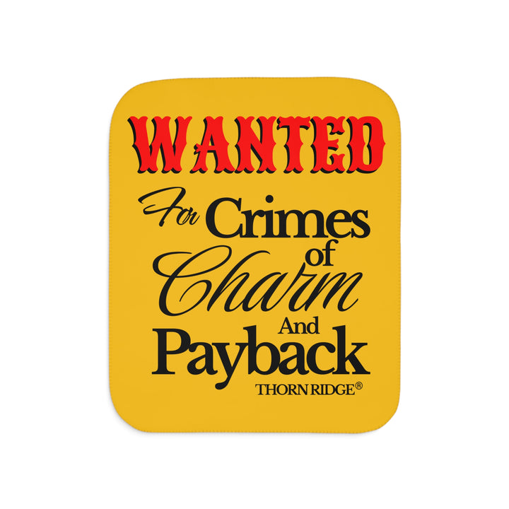 Yellow Sherpa Blanket with Wanted for crimes of charm and payback text branded Thorn Ridge® Wanted is in red text and the rest is in black text.