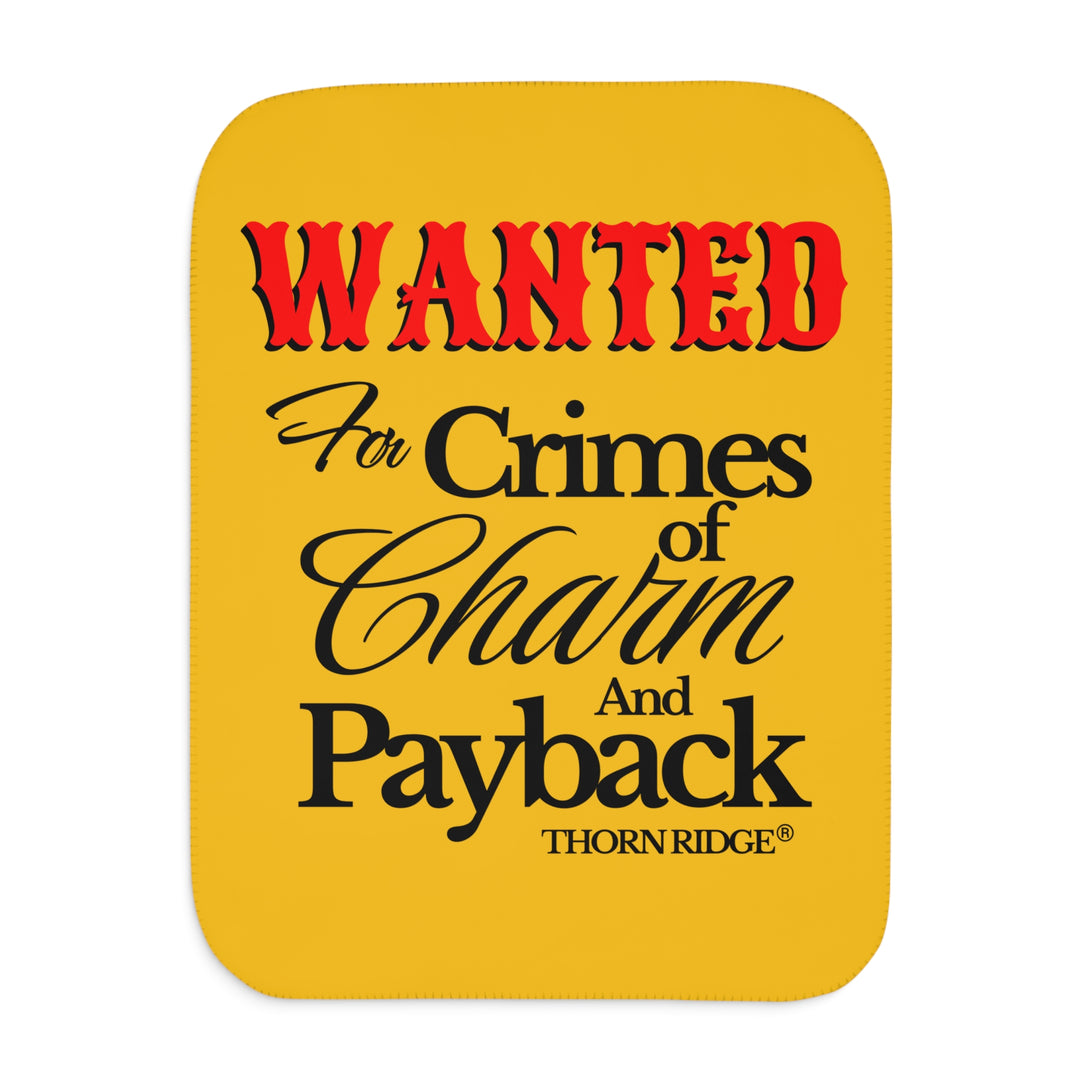 Yellow Sherpa Blanket with Wanted for crimes of charm and payback text branded Thorn Ridge® Wanted is in red text and the rest is in black text.