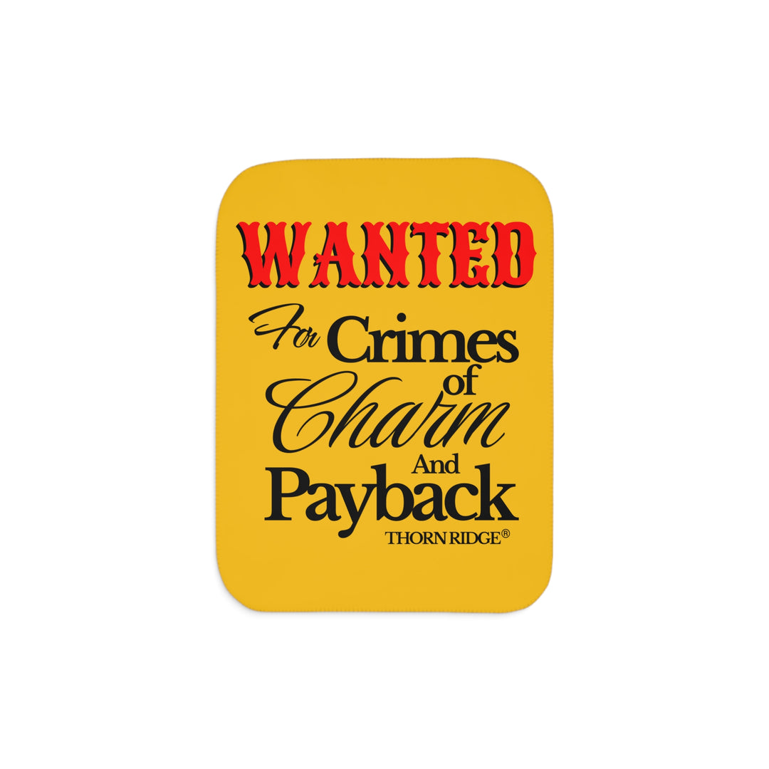 Yellow Sherpa Blanket with Wanted for crimes of charm and payback text branded Thorn Ridge® Wanted is in red text and the rest is in black text.