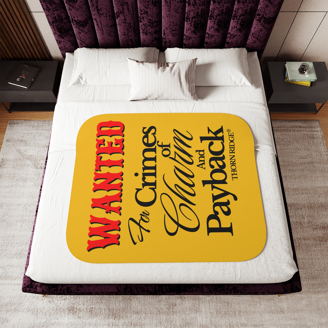 Yellow Sherpa Blanket with Wanted for crimes of charm and payback text branded Thorn Ridge® Wanted is in red text and the rest is in black text.