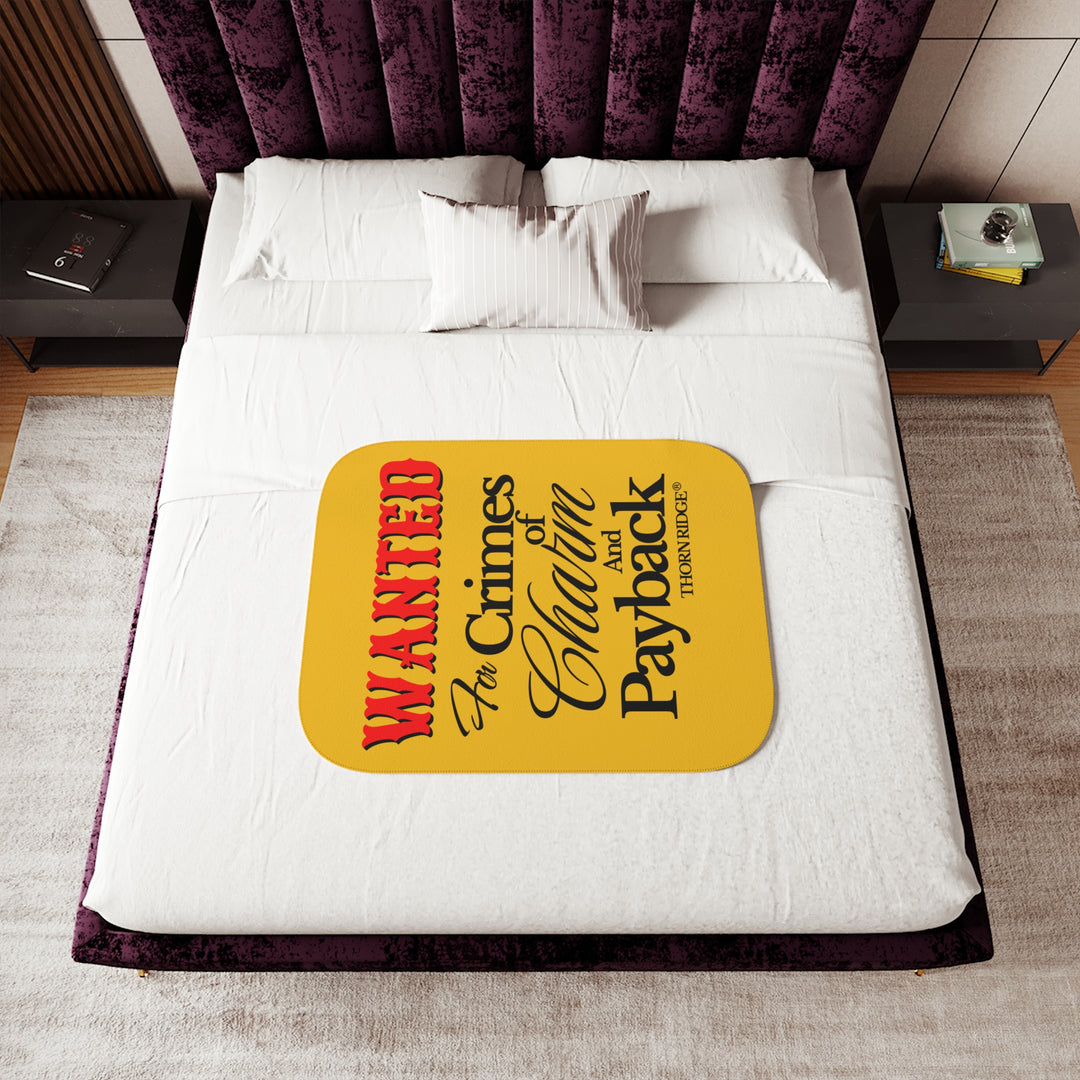 Yellow Sherpa Blanket with Wanted for crimes of charm and payback text branded Thorn Ridge® Wanted is in red text and the rest is in black text.