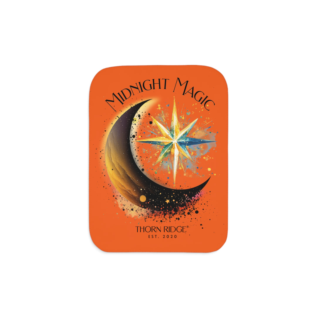 Midnight Magic orange sherpa blanket featuring a star and moon design and branded as Thorn Ridge® EST 2020