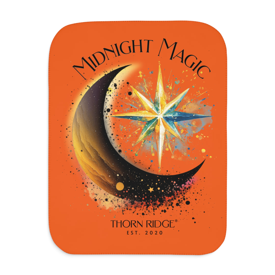 Midnight Magic orange sherpa blanket featuring a star and moon design and branded as Thorn Ridge® EST 2020
