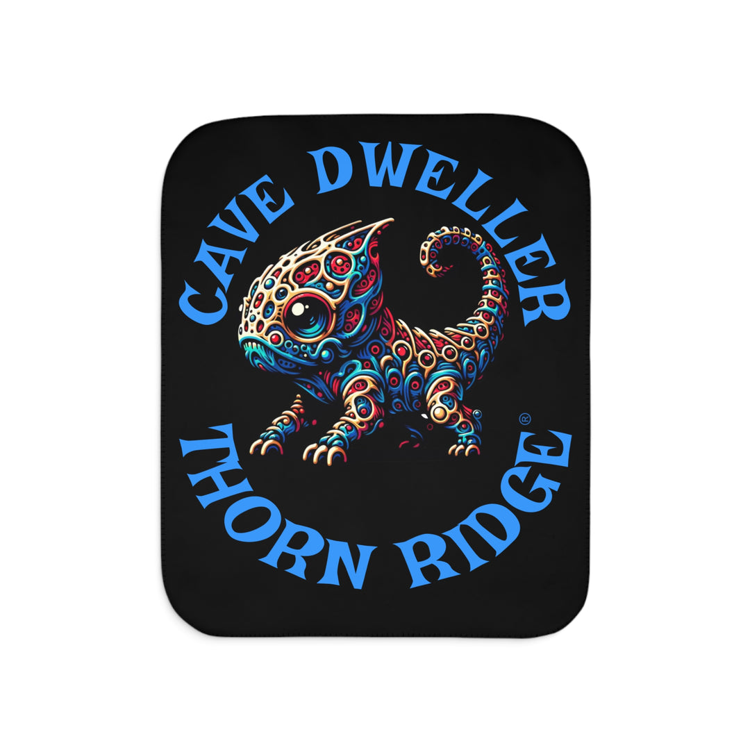 Cave Dweller by Thorn Ridge® black sherpa blanket featuring a weird lizard creature.