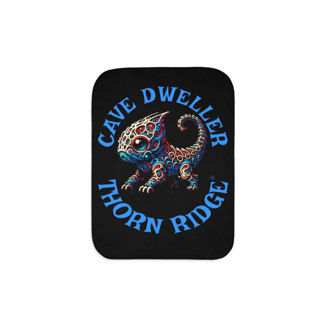 Cave Dweller by Thorn Ridge® black sherpa blanket featuring a weird lizard creature.