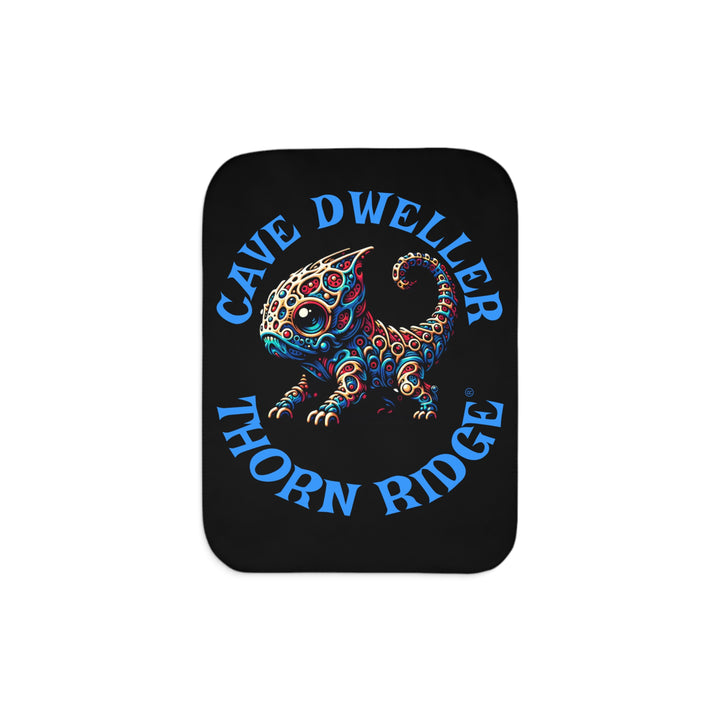 Cave Dweller by Thorn Ridge® black sherpa blanket featuring a weird lizard creature.